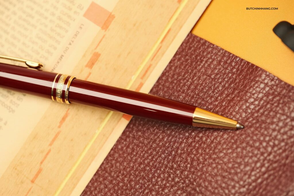 Burdundy red and the famous Montblanc Meisterstuck Classique rollerball pen - burdundy red and the famous montblanc meisterstuck classique rollerball pen