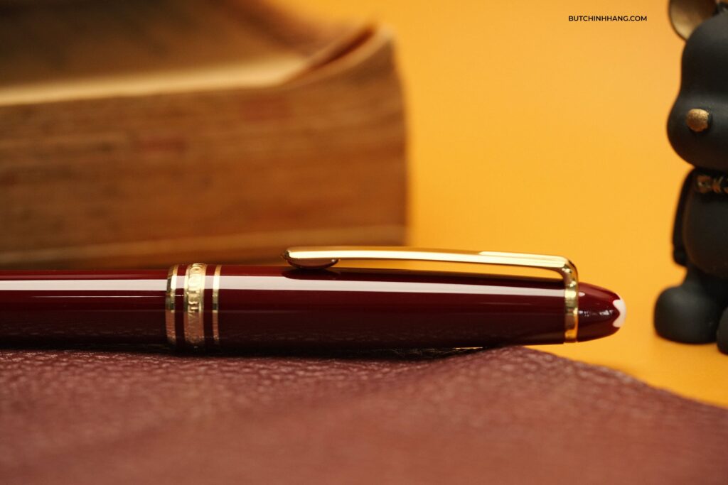 Burdundy red and the famous Montblanc Meisterstuck Classique rollerball pen - burdundy red and the famous montblanc meisterstuck classique rollerball pen 2